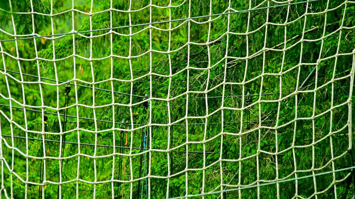 net mending twine green used for effective repairs in a lush green background.