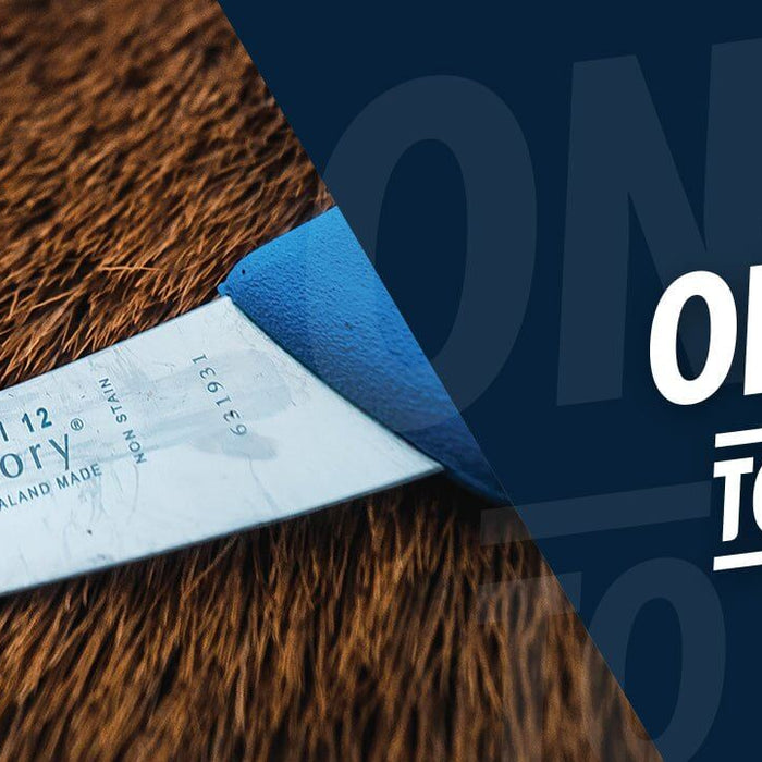 Victory Knives New Range knife displayed on a textured surface with the slogan Onwards to Victory!