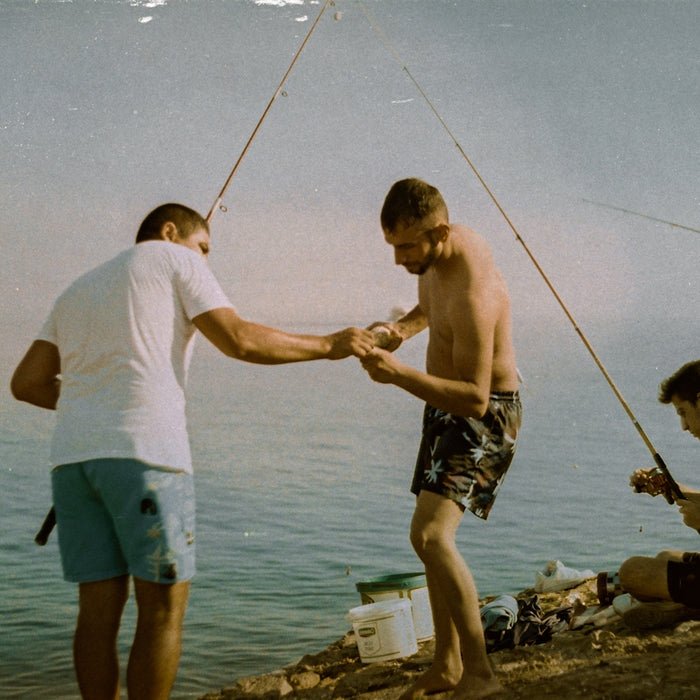 a group of men fishing