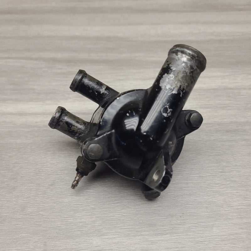 VT250F (MC08) Thermostat housing and temp sender – view 1