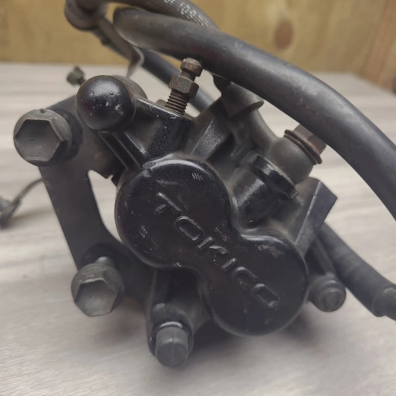 Motor Morgue Brake Parts GSF250V Front brake caliper and line GSF250V Front brake caliper and line | Action Outdoors NZ