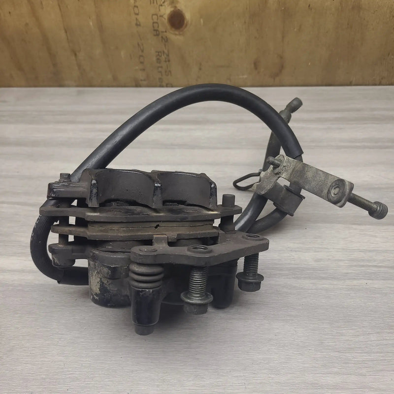 Motor Morgue Brake Parts GSF250V Front brake caliper and line GSF250V Front brake caliper and line | Action Outdoors NZ
